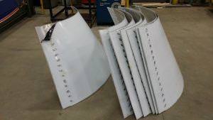 Following are 3/16 inch thick aluminium light shades rolled for an American casino where the sections are in quarters and bolted together for an aesthetic effect.