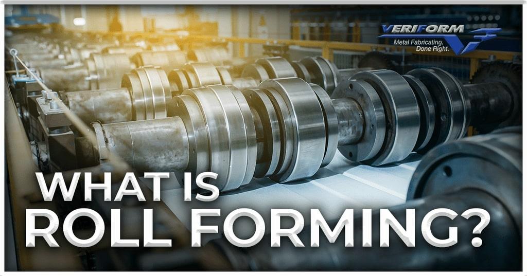 Veriform blog image "What is Roll Forming" picture of metal roll forming machine. Rows of massive metal rollers lined up in a row.